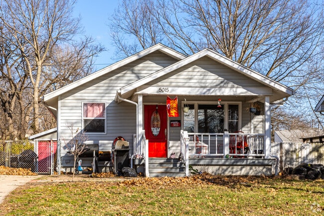 Some homes have small porches and fenced yards in the Glenhaven neighborhood.