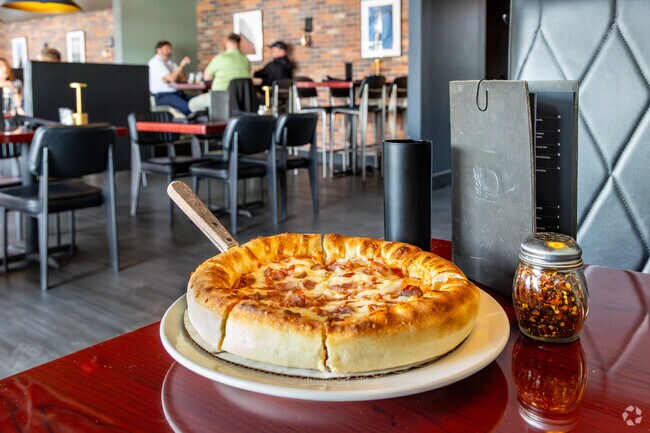 Try the pizza at Domenic’s Bistro and Wine Bar near Southridge Greens.