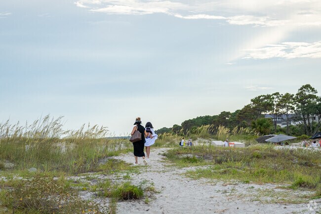 Enjoy a walk through the dunes in the Shipyard neighborhood.