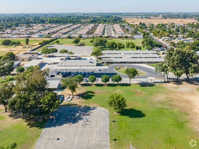 Looking South along Mineral King Elementary School at the homes of Visalia.