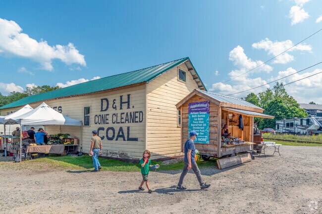 North Creek Farmers Market runs from summer solstice to fall equinox supporting local vendors.