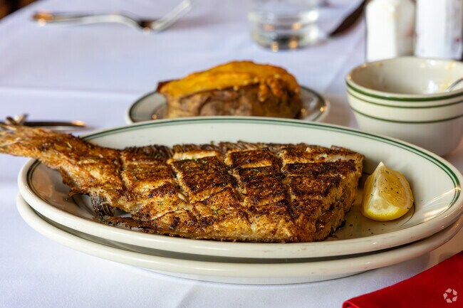 The grilled flounder at Poor Boy's Riverside Inn in Pilette is perfectly cooked for those who enjoy seafood.
