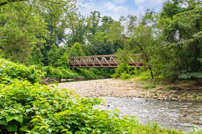 Herring Run Park in Belair-Parkside features a walking path and a calming stream.
