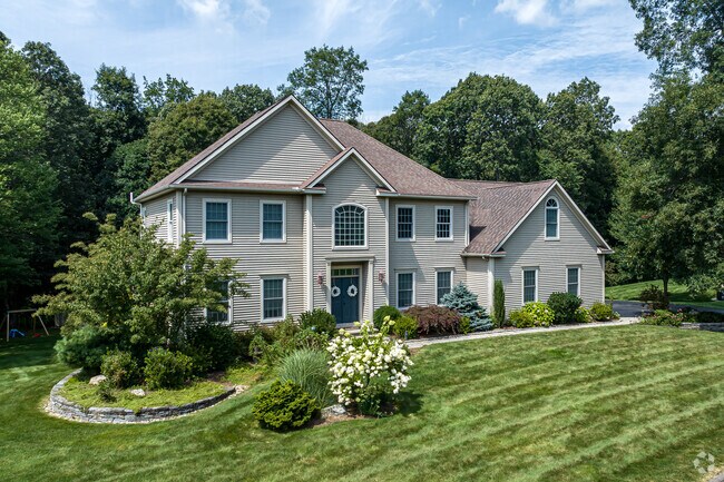Newer homes in Bolton are well maintained with immaculate landscaping.