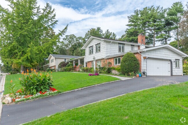 Gorgeous rows of ranch style homes adorn the streets of Locust Valley.