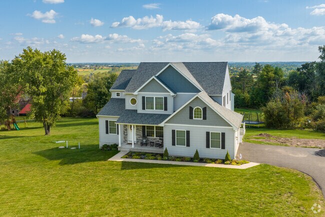 Custom build homes in Salford are trending in the area with spacious yards and beautiful views.