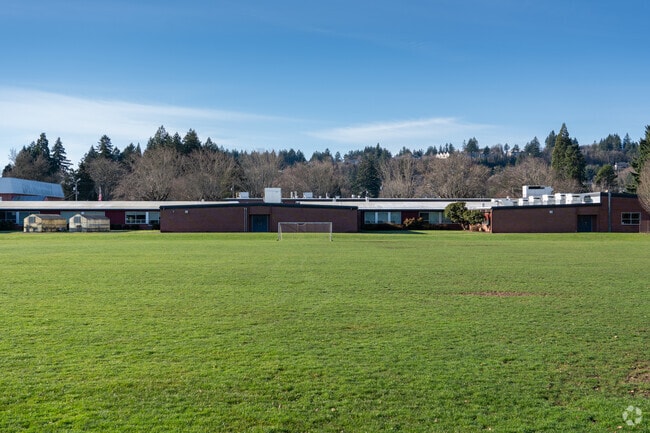 A large soccer and hockey field for student use.