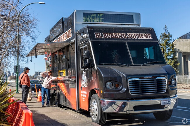 Food trucks regularly serve hotel guests along the Embarcadero in Oakland.
