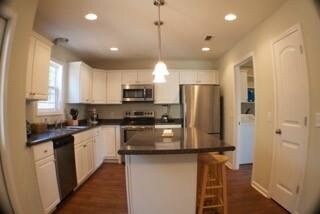 Kitchen --Door leads to garage and laundry room