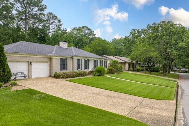 A row of ranch-style homes in River Mountain, Arkansas.