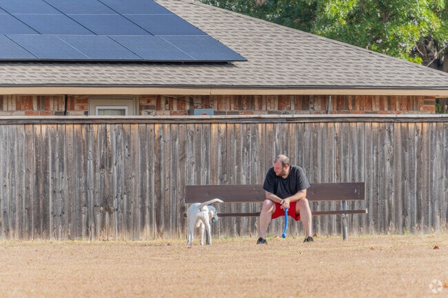 Locals enjoy playing with their dogs at Gray-Warr Park.