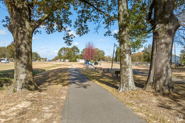 The paved walking path at Coldwater Park is perfect for a leisure stroll.