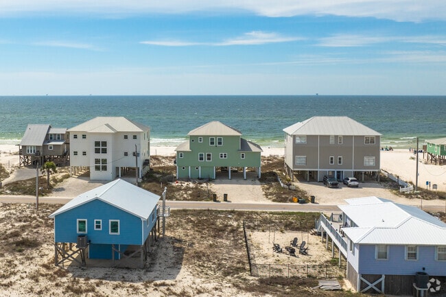 Large beach houses welcome guests to Gulf Highlands on Alabama's gorgeous Gulf coast.