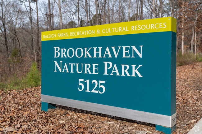 Brookhaven Nature Park is a 26 acre wooded area with a paved walking trail.