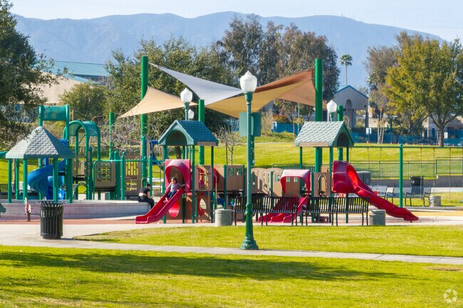 Kids enjoying the playground at Citrus Park in the South Corona community of Corona, Ca.