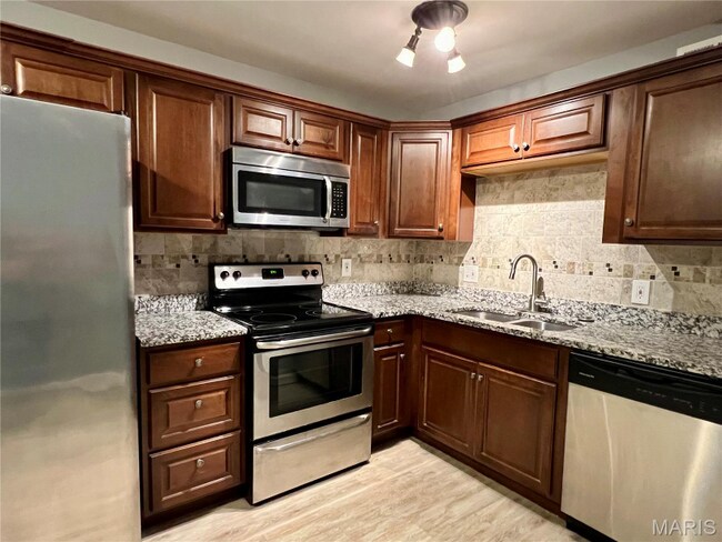 6990 Colonial Woods Dr unit 59, Saint Louis, MO 63129 - photo 3