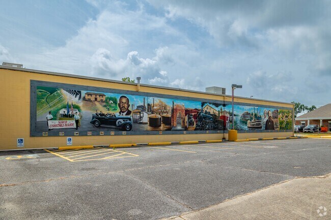 Norco’s heritage is captured in a mural at the Throw Me Something Mister gift shop.