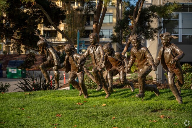 Admire brass sculptures at Marina Park Public Beach near Lakeview Kirkland.