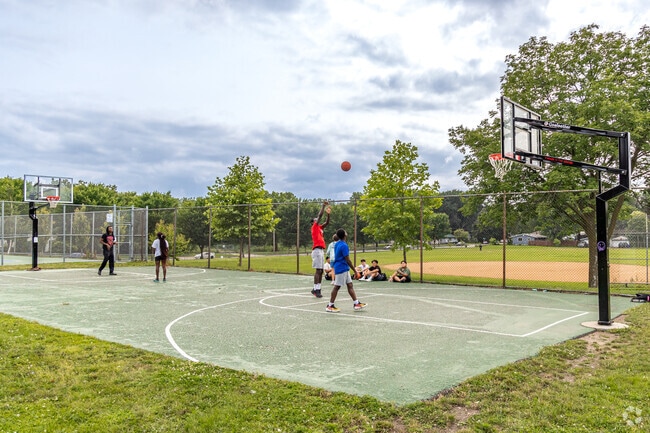 Residents enjoy shooting hoops at Prosperity Heights Park.