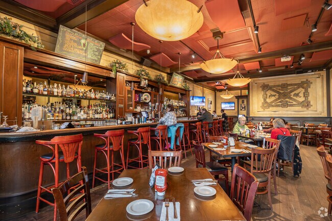 The warm interior at Fiddlers Green in Millbrae creates the perfect atmosphere for dining and drinks.