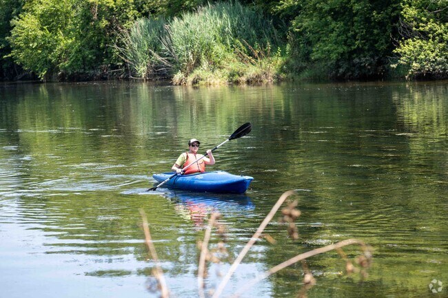 People enjoy kayaking at the Riverview Farmstead Preserve near the High Meadows area.
