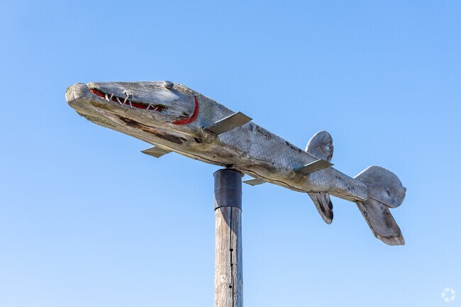 The spinning wood-carved fish on top of Carlson's smoked fish is a landmark in Leland.