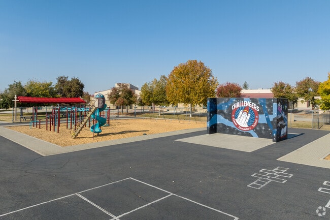 Here is a view of the playground, handball court and 4 square at Cesar E Chavez Elementary.