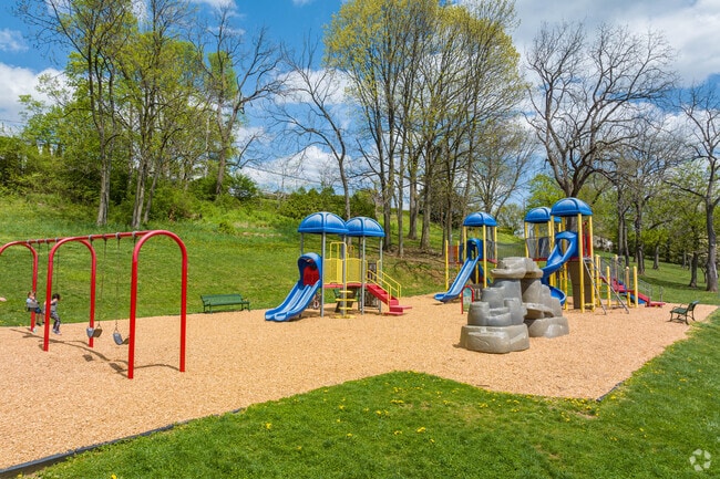Enjoy time with the kids at the Red Caboose Park Playground near West Lawn.