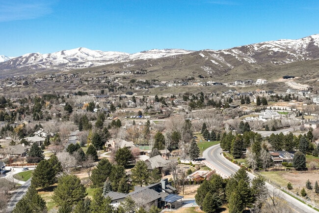 The Alpine neighborhood is surrounded by scenic mountain views.