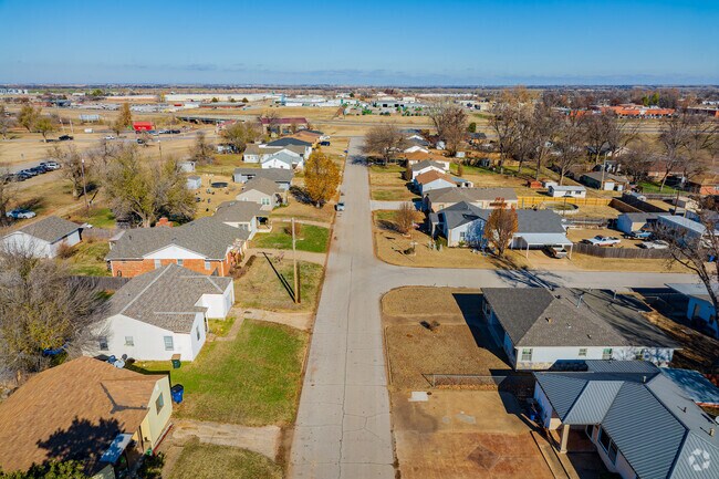 Area view of rows of ranch-style homes in Chickasha Neighborhood.