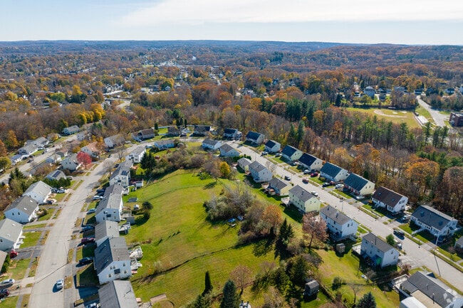 Residents of Webster Square enjoy homes with large backwards.