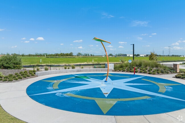 A compass feature adds coastal charm to Windrose in Holiday Lakes.