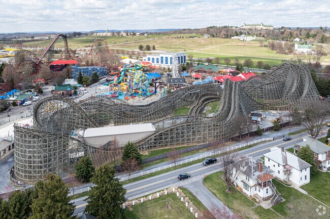 Hershey Park, about 10 miles west, draws millions with coasters and a water park.