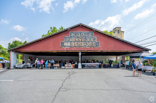 Every Saturday Farmville residents gather to shop at the farmers market, which has a permanent awning for stalls to set up.