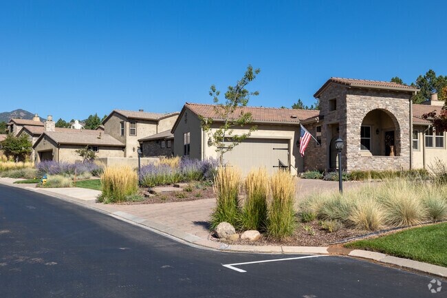 Custom homes with wide streets and spacious lots are common in Peregrine.