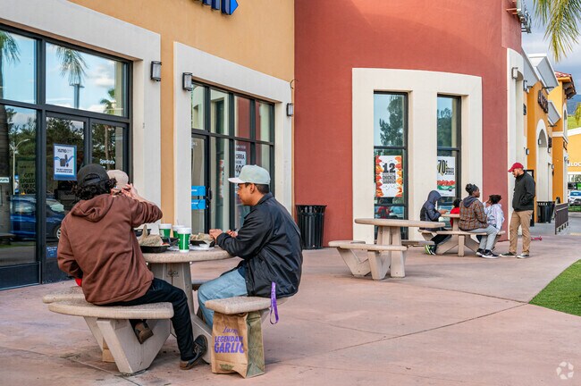 University locals enjoy the many eateries and seating offered at the Campus Crossroads plaza.