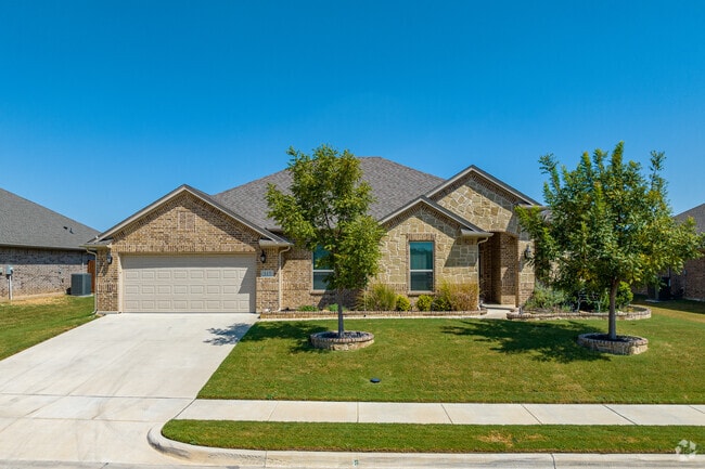 Most residential streets in Saginaw feature sidewalks and tree shaded yards.