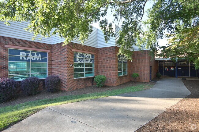 Northeast Guilford High School offers tech programs near Summit Hills.