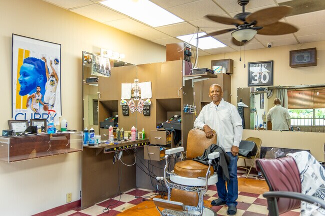 Get your next fresh haircut at Genesis Barbershop in Mather and Wells.