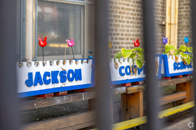 The Jackson Andrew School has community planters in the front of the school for students.