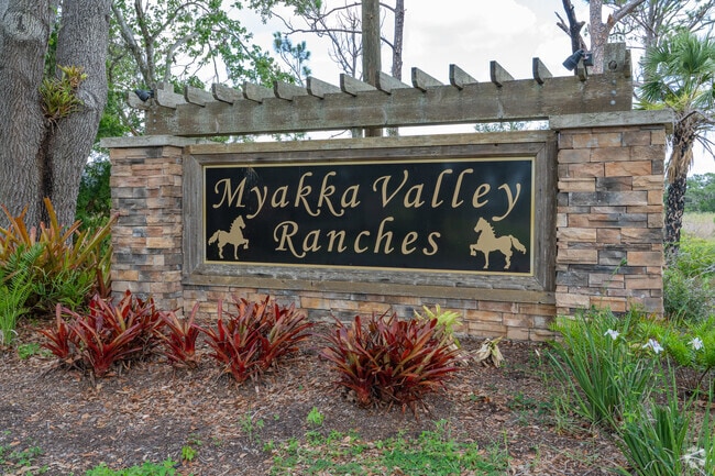 Myakka Valley Ranches signage features horse silhouettes, reflecting its equestrian heritage.