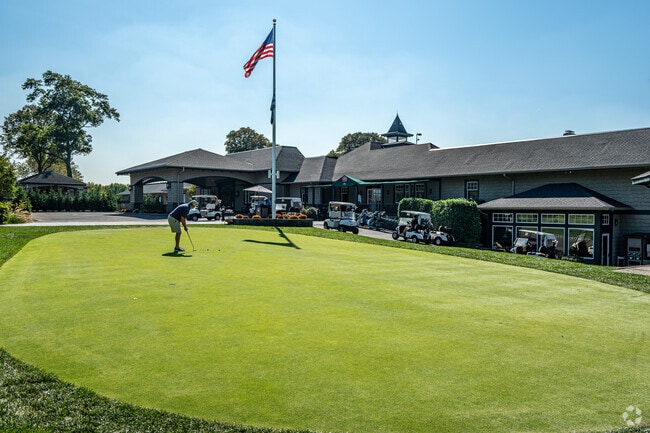 Pristine greens and serene beauty at Cherry Hill Country Club in Garden City.