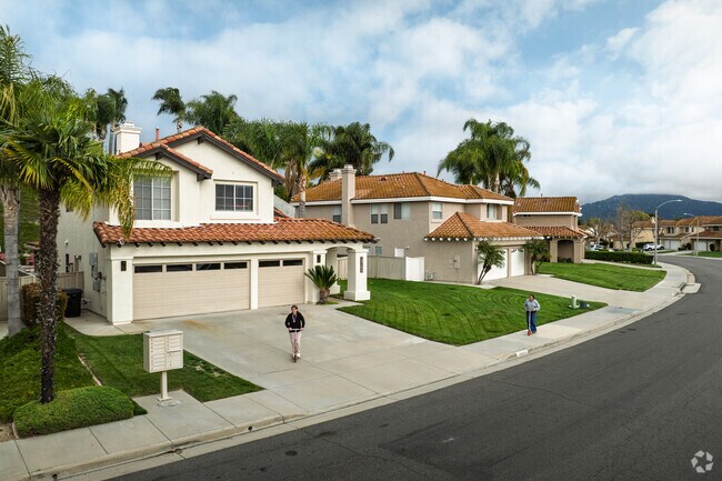 Spanish Revivals line a peaceful street in Rancho Highlands.