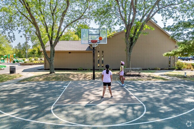 The children of Tuttle West enjoy playing basketball at Ted Kaltenbach Park.