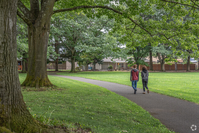 Residents of Oakbrook enjoy the serene atmosphere at Oakbrook Park in Vancouver, WA.
