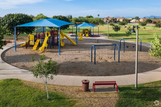 Children of Sun Groves can choose between shaded playgrounds, swing sets, and large fields.