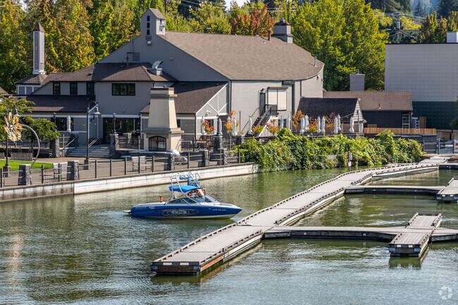 Evergreen boaters ply the calm waters of Lakewood Bay.
