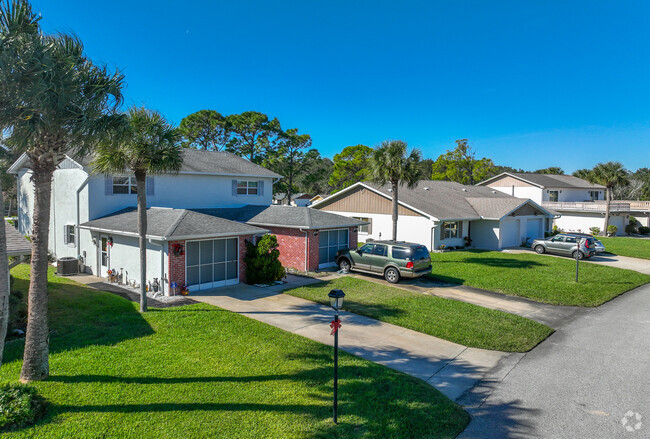 Harbor Point streets are lined with several style homes built in the late 80s.
