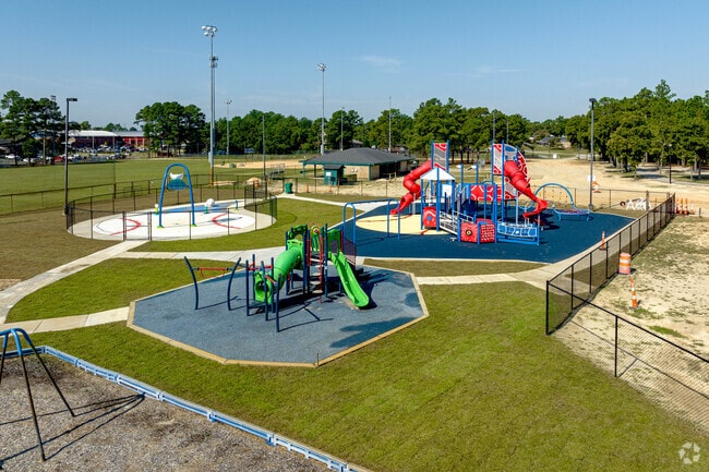 Hope Mills Municipal Park has an extra-large playground for children in South View, NC.