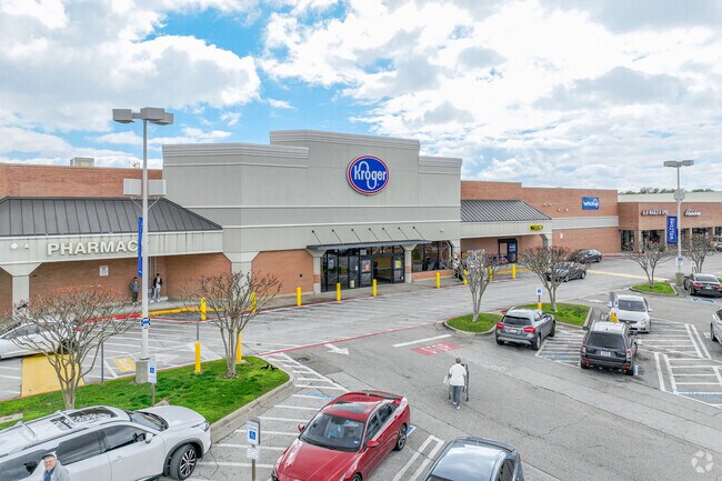 Residents of Southeast Carrollton go grocery shopping at the local Kroger.